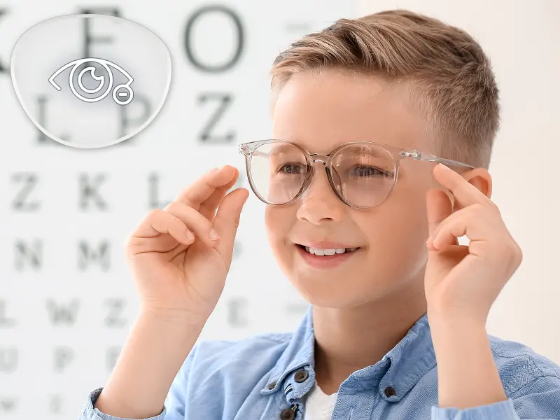 a little boy wearng myopia lens